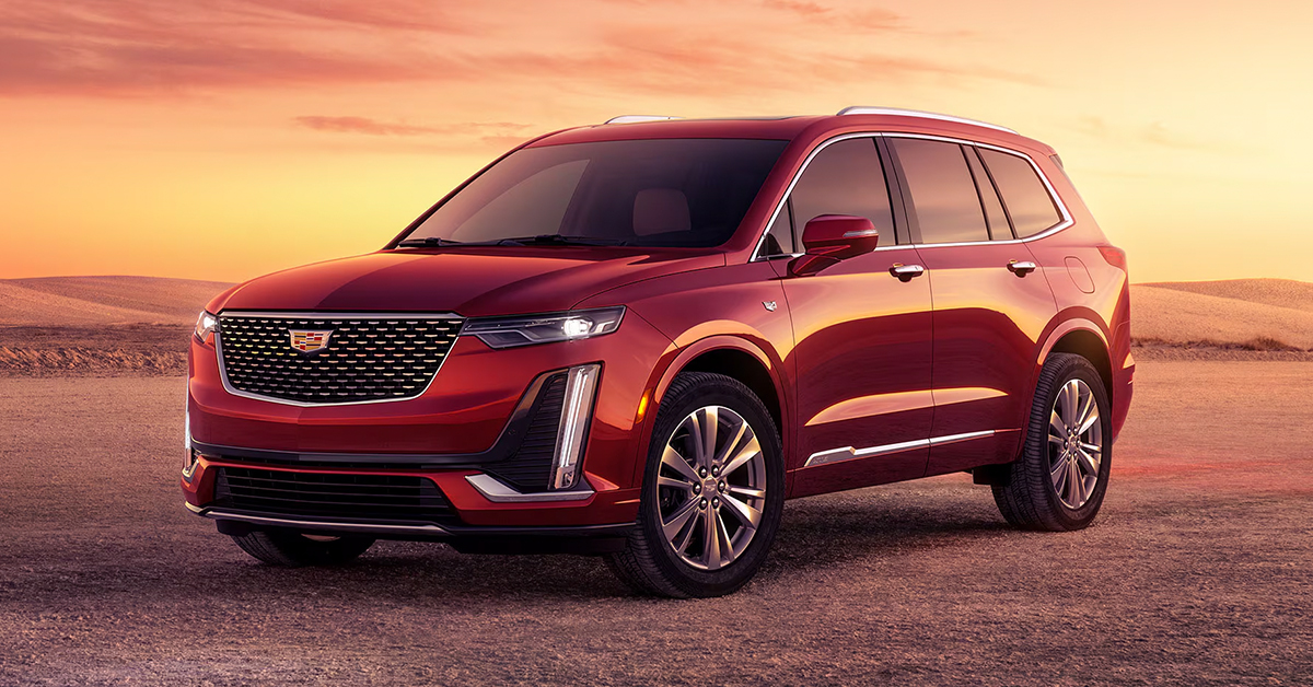 a parked 2025 Cadillac XT6 in Radiant Red Tintcoat